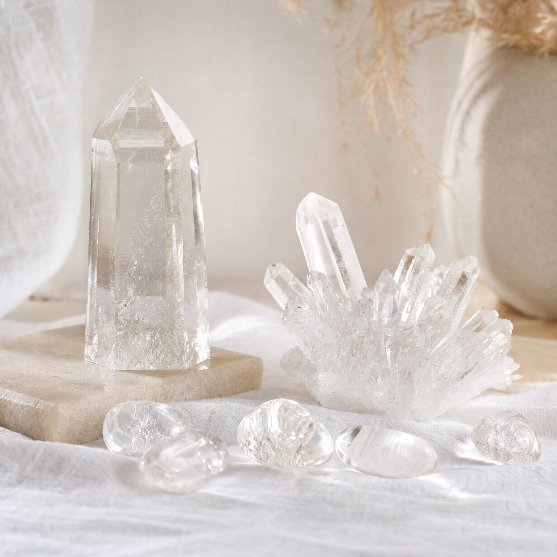 Clear Quartz crystals - tower, cluster and tumbled stones