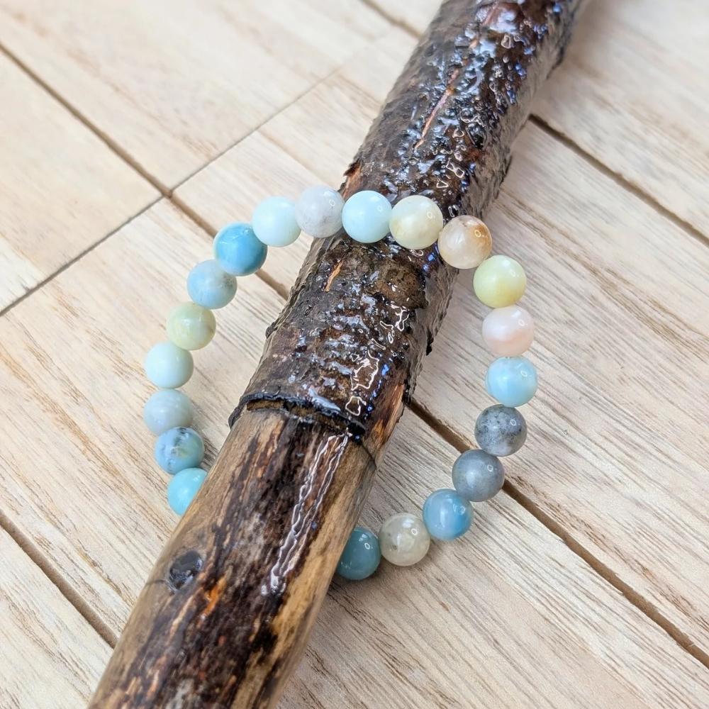 Blue-green crystal bracelet from Zen Collection, perfect for emotional healing and balance