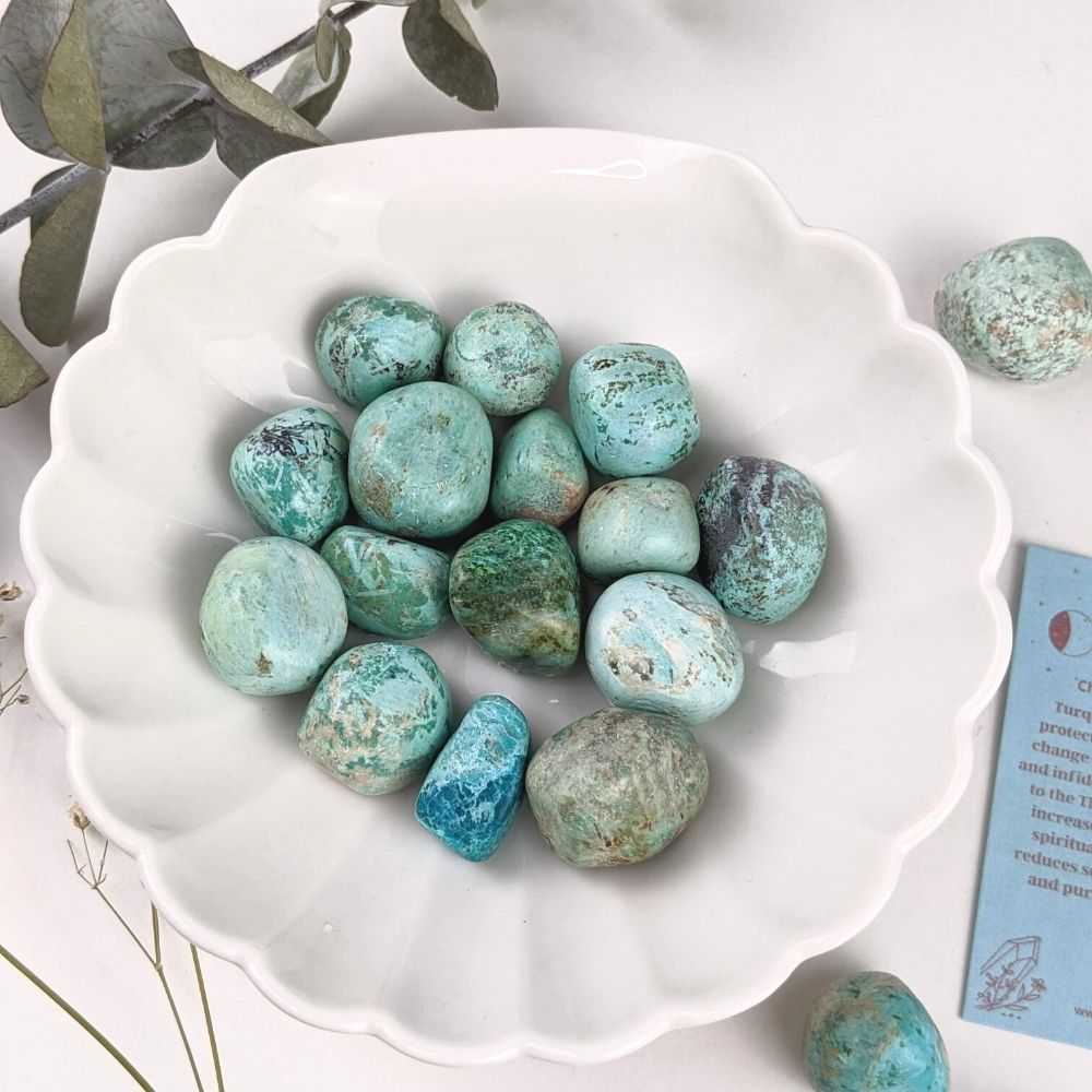 Natural turquoise stone in blue and green hues, known for wisdom, protection, and emotional healing, used in jewelry and spiritual practices. Available at Zen Collection Metaphysical Store