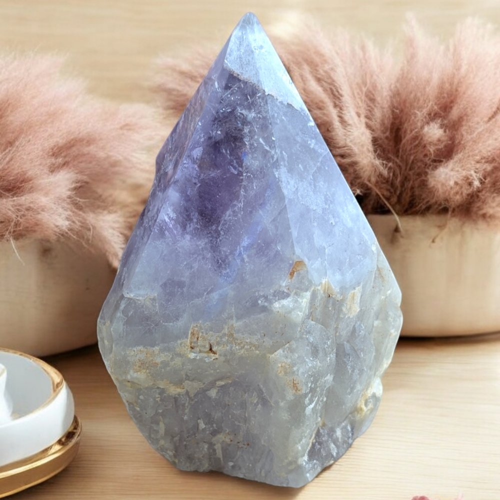 Amethyst Point with hints of iron on a soft background.