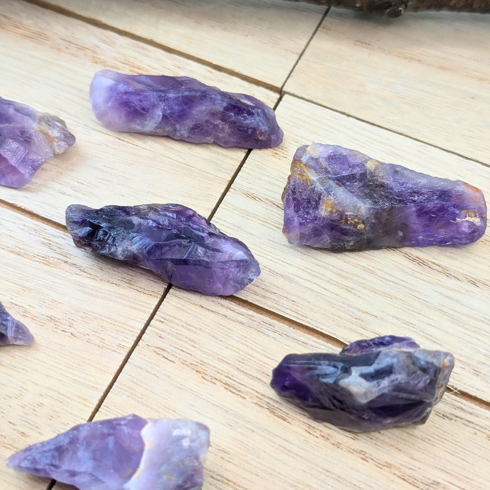 Close-up of raw Amethyst points with deep purple hues