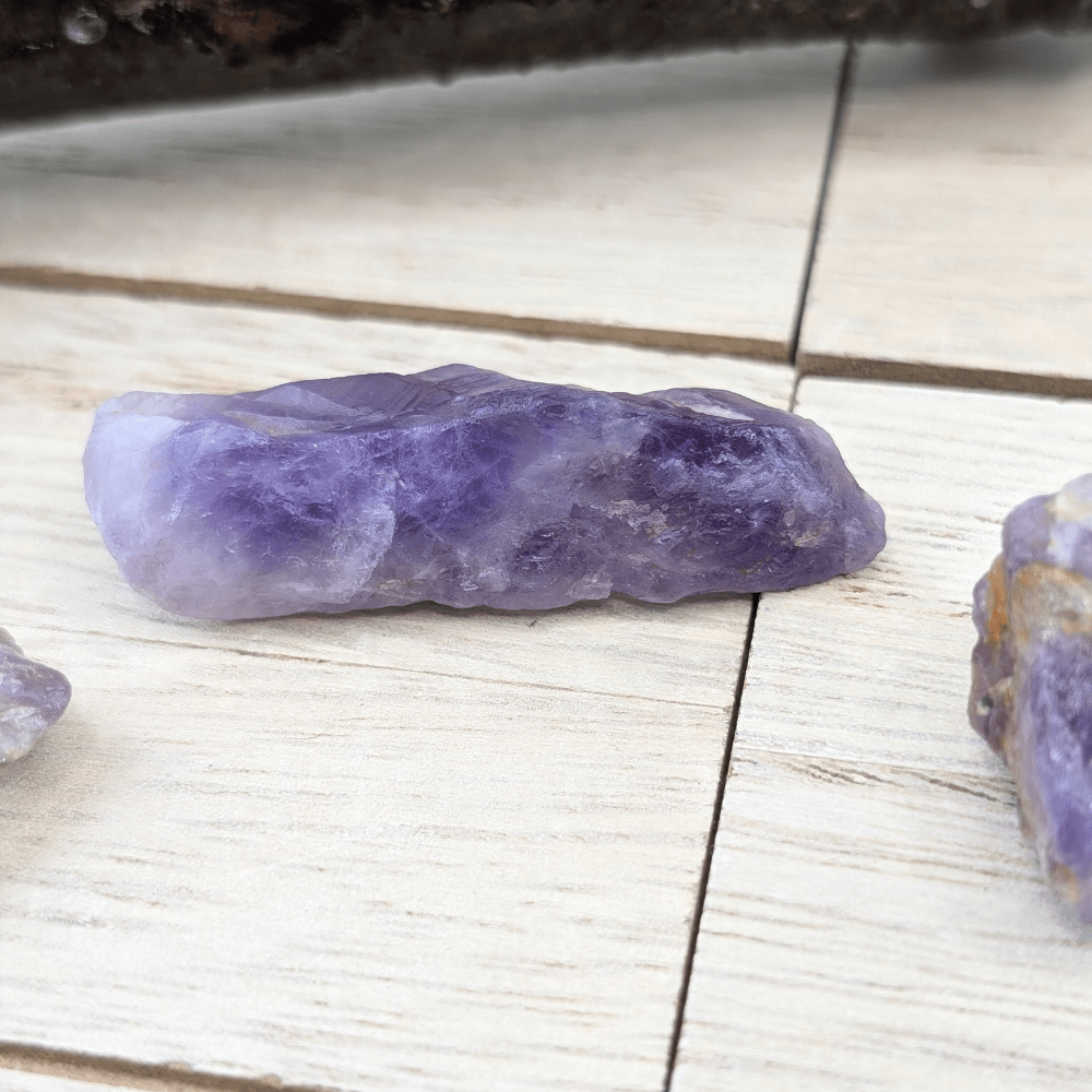 Raw Amethyst stones for manifesting abundance and wisdom