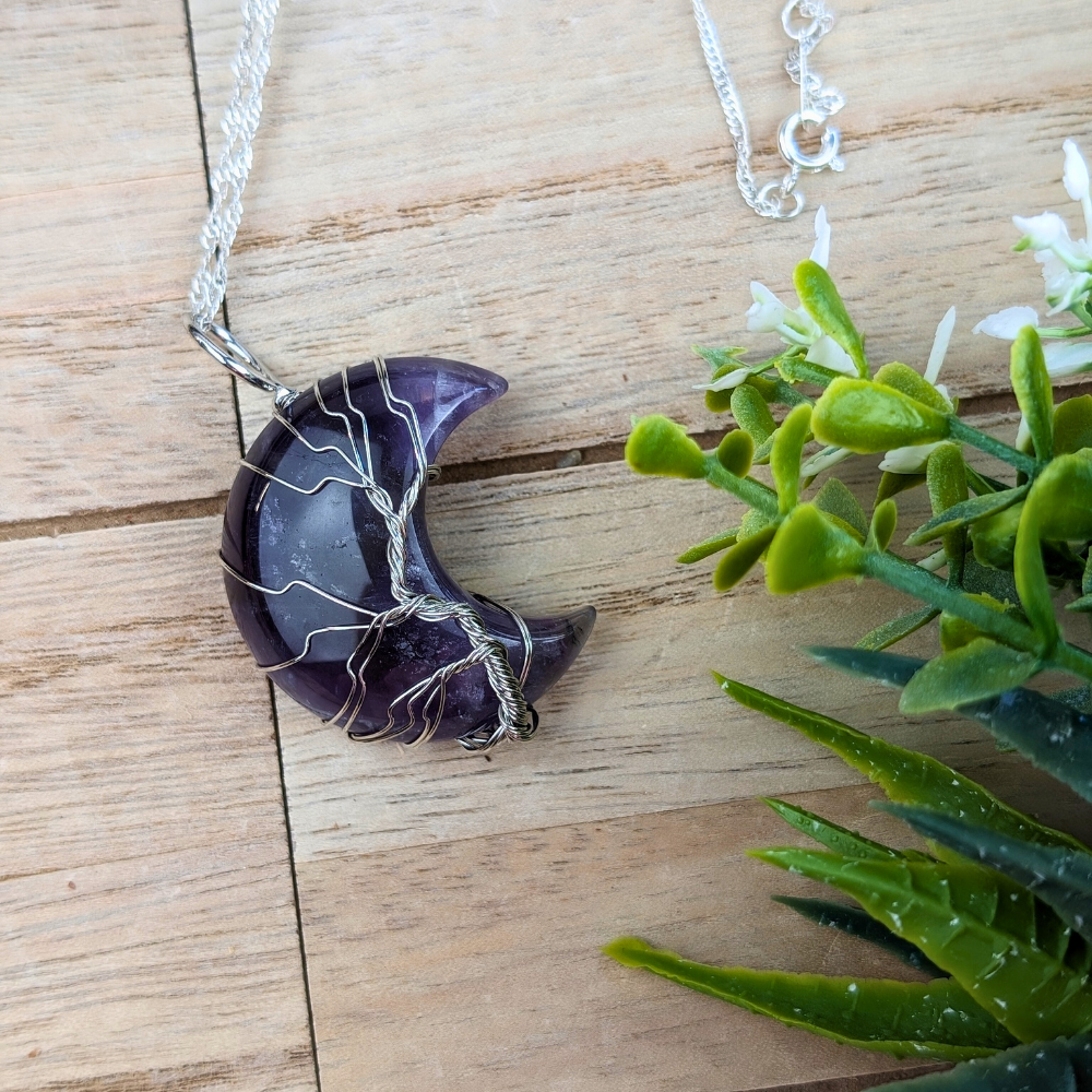 Amethyst moon necklace with silver wire wrapping, perfect metaphysical gift for women.