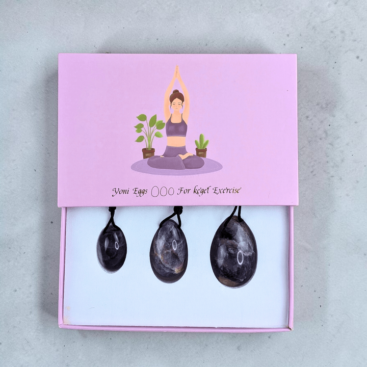 lose-up of Amethyst Yoni Egg - A detailed view of the amethyst yoni egg, showcasing its deep purple hues and natural patterns.