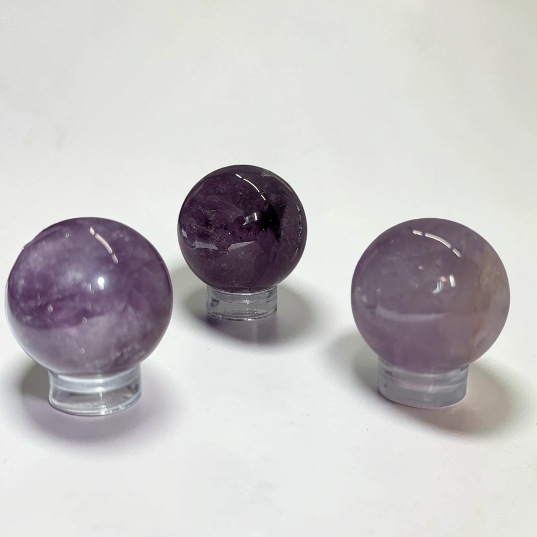 Amethyst Crystal sphere crystals for crown chakra for higher consciousness and clarity. Shop In-store or Online Now with Zen Collection Metaphysical Store in Barrie ontario canada 