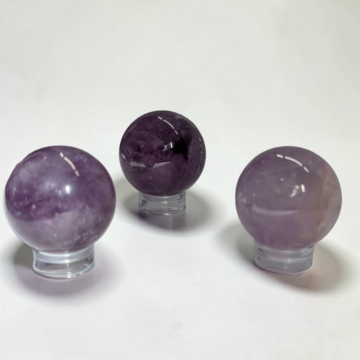 Amethyst Crystal sphere crystals for crown chakra for higher consciousness and clarity. Shop In-store or Online Now with Zen Collection Metaphysical Store in Barrie ontario canada 