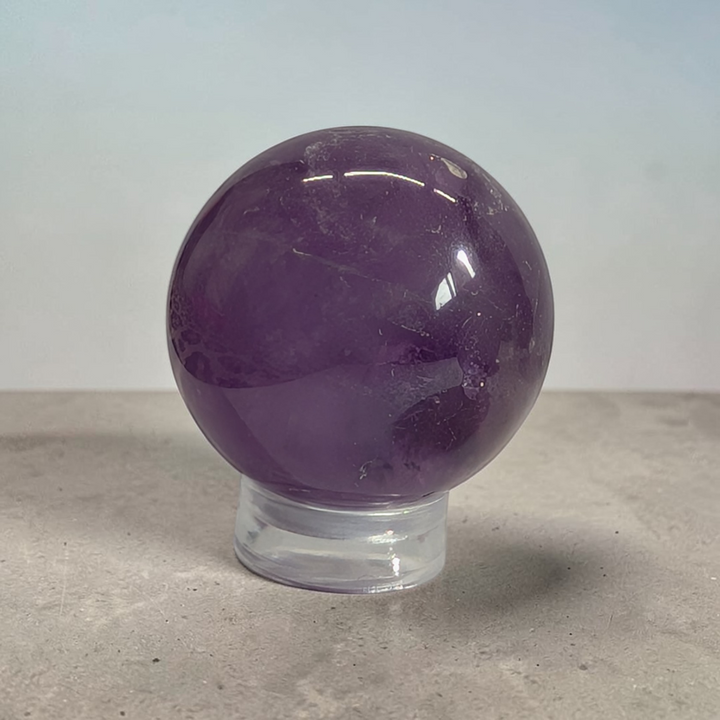 Amethyst Crystal sphere crystals for crown chakra for higher consciousness and clarity. Shop In-store or Online Now with Zen Collection Metaphysical Store in Barrie ontario canada 