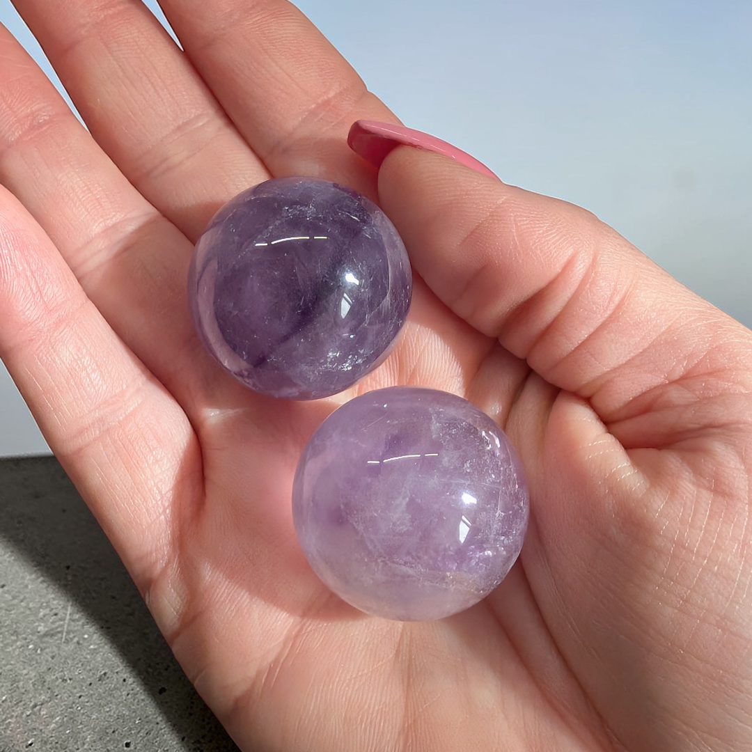 Amethyst Crystal sphere crysal for crown chakra for higher consciousness and clarity. Shop In-store or Online Now with Zen Collection Metaphysical Store in Barrie ontario canada 