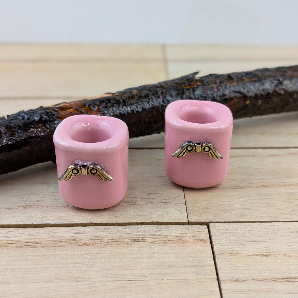 Delicate pink ceramic candle holder for healing rituals