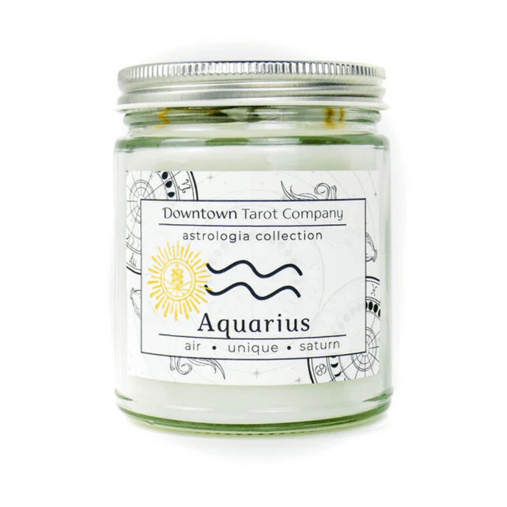 Aquarius zodiac candle with labradorite and moonstone crystals