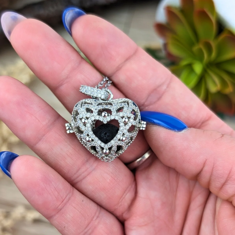 Intricate silver heart locket with 17" chain for aromatherapy