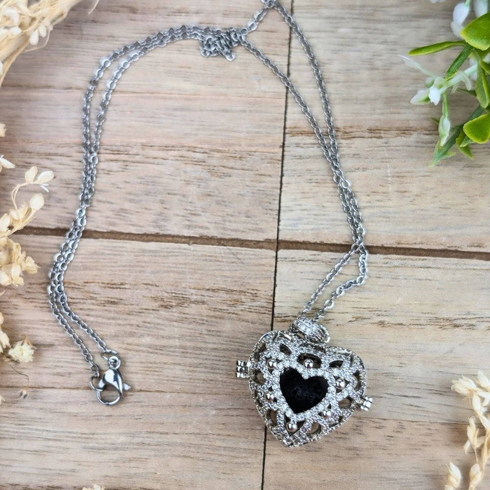 Silver heart diffuser necklace for wearing essential oils