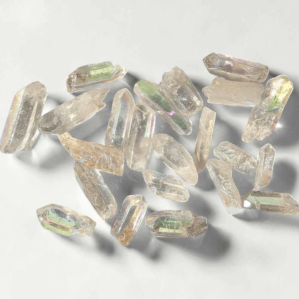 Aura Clear Quartz crystals for crown Chakra healing. Available in-store and online at Zen Collection Metaphysical Store 