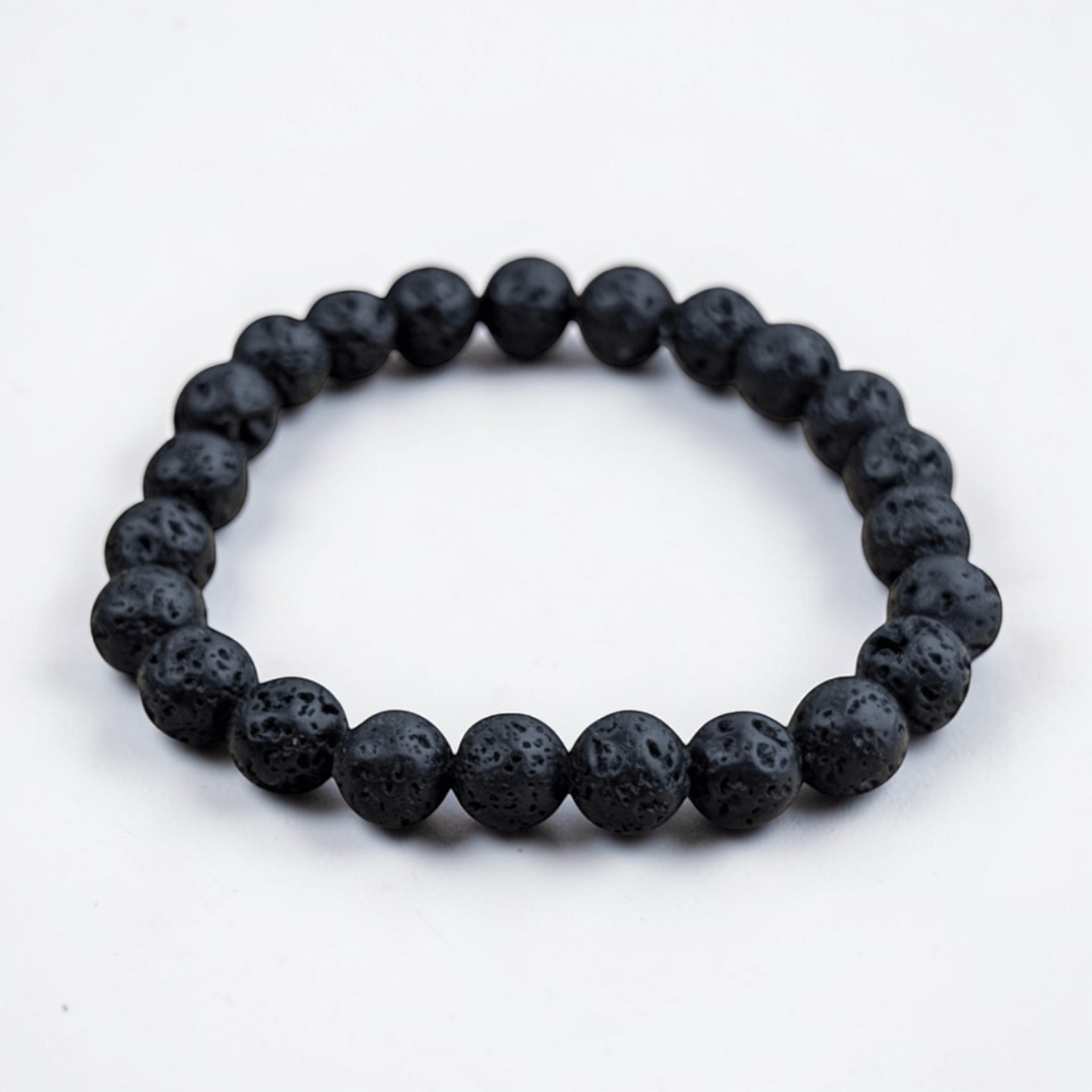 Close-up of porous lava rock beads used in a bracelet design.