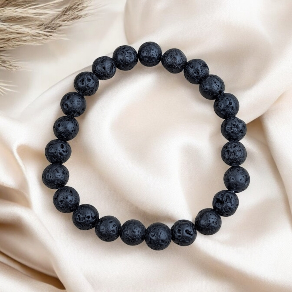 Close-up of porous lava rock beads used in a bracelet design.