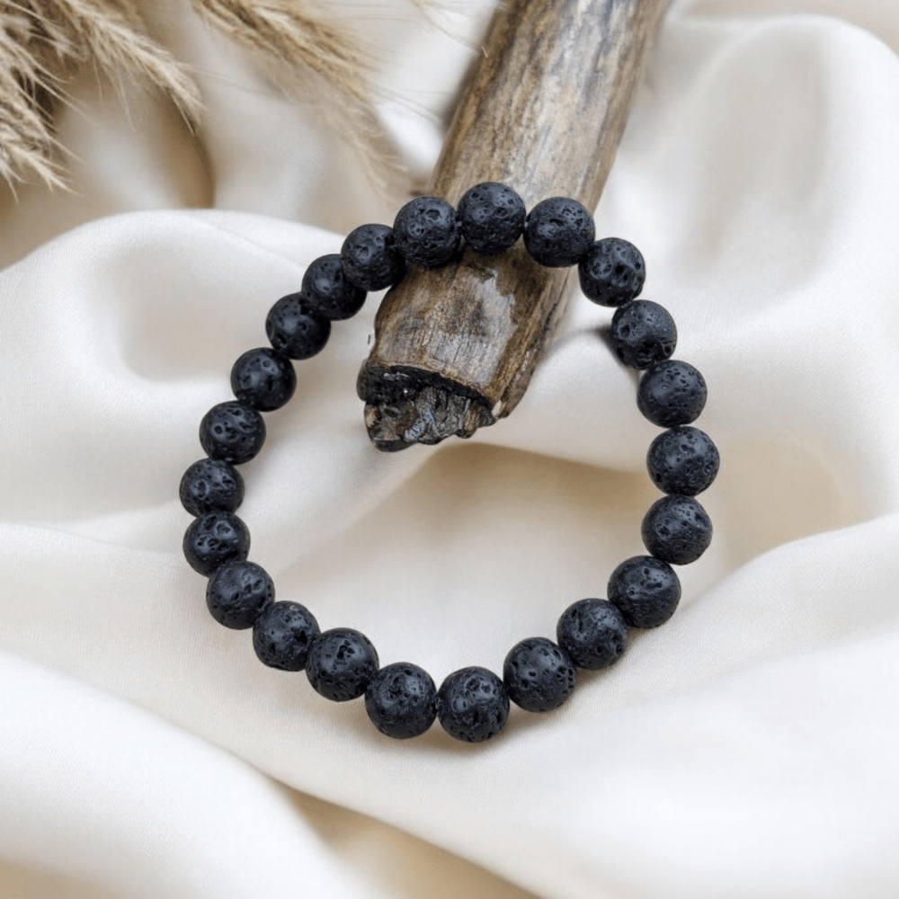 Natural black lava rock bracelet for grounding and stress relief.