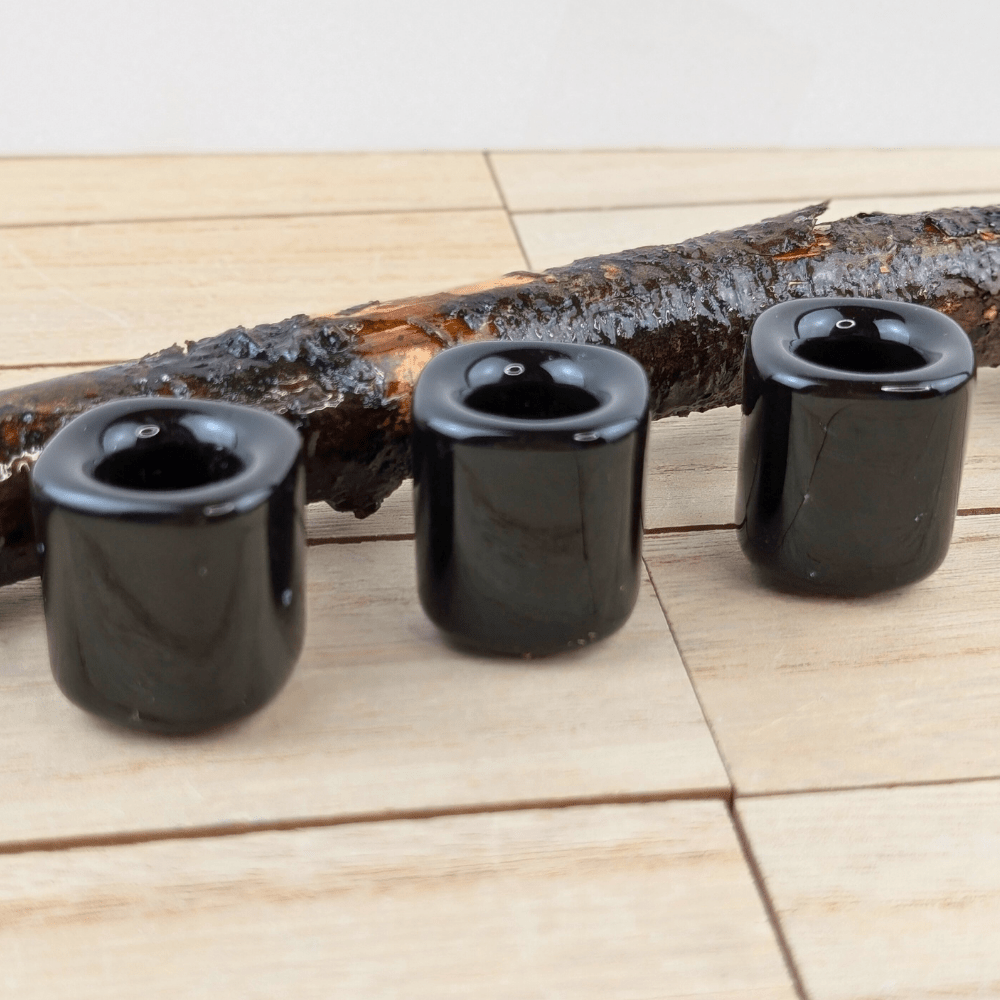 Black mini ritual candle holder made of ceramic.
