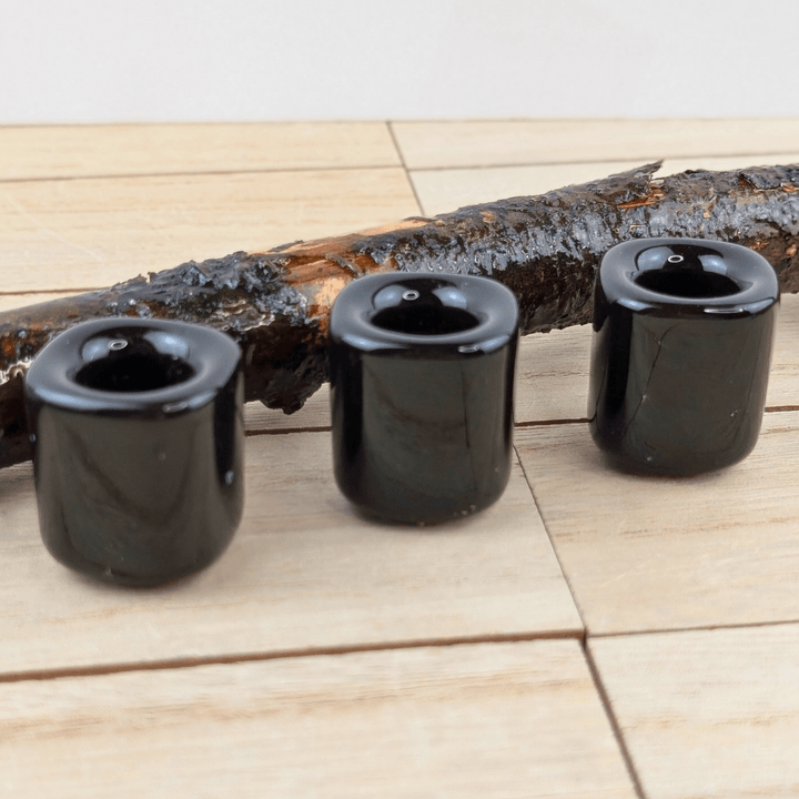 Black mini ritual candle holder made of ceramic.
