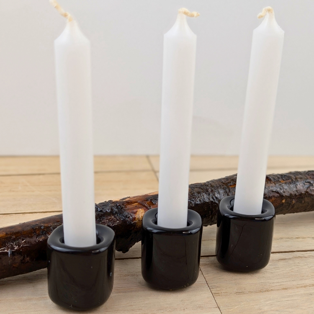 Plain black ceramic candle holder for rituals and spell candles.