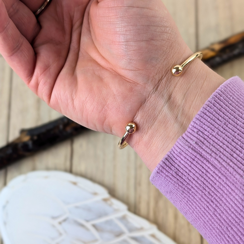 Adjustable cuff bracelet hand-wrapped with gold-plated iron