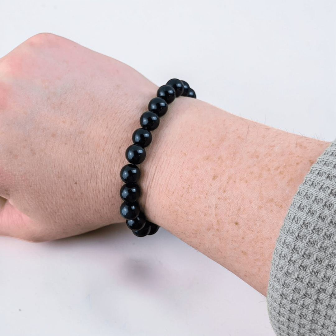 Black obsidian crystal bracelet for truth, protection and root chakra healing. Available at Zen Collection Metaphysical Store Canada. Shop in-store or online now