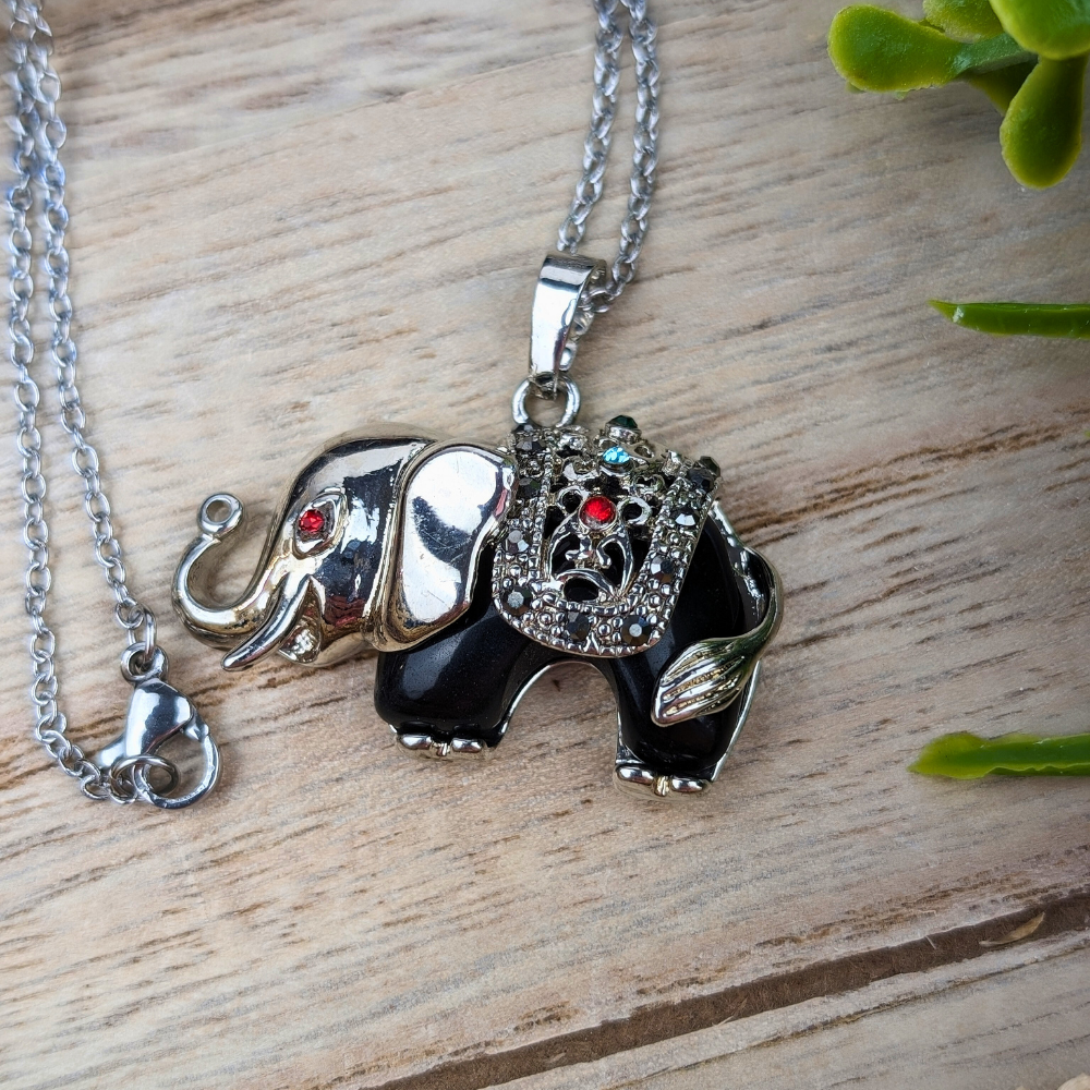 Black Obsidian Elephant Necklace on display – Showcasing a beautiful black obsidian necklace with an elephant pendant, symbolizing protection and grounding.