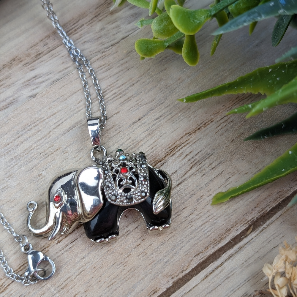 Black Obsidian Elephant Necklace on display – Showcasing a beautiful black obsidian necklace with an elephant pendant, symbolizing protection and grounding.