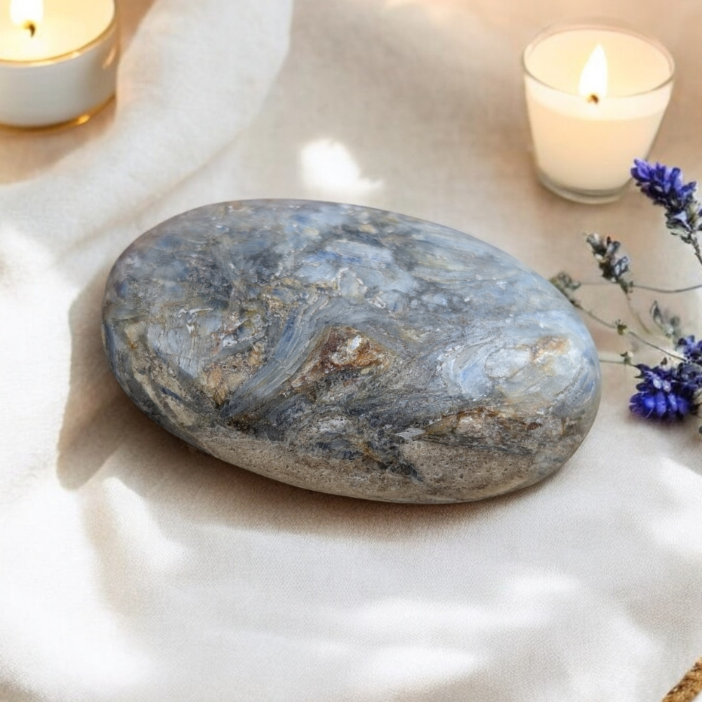 Polished Blue Kyanite Palm Stone showcasing natural layers.