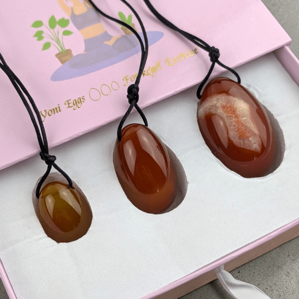 Natural carnelian crystal yoni eggs for meditation.