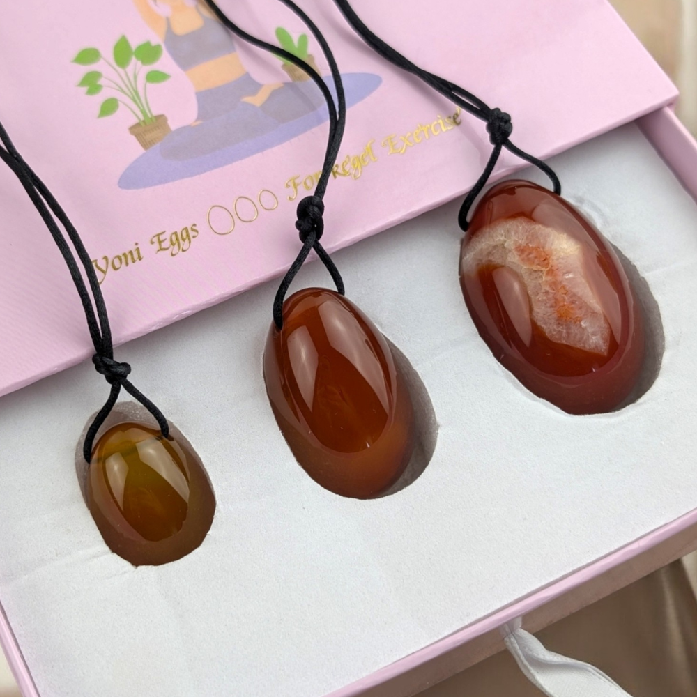 Natural carnelian crystal yoni eggs for meditation.