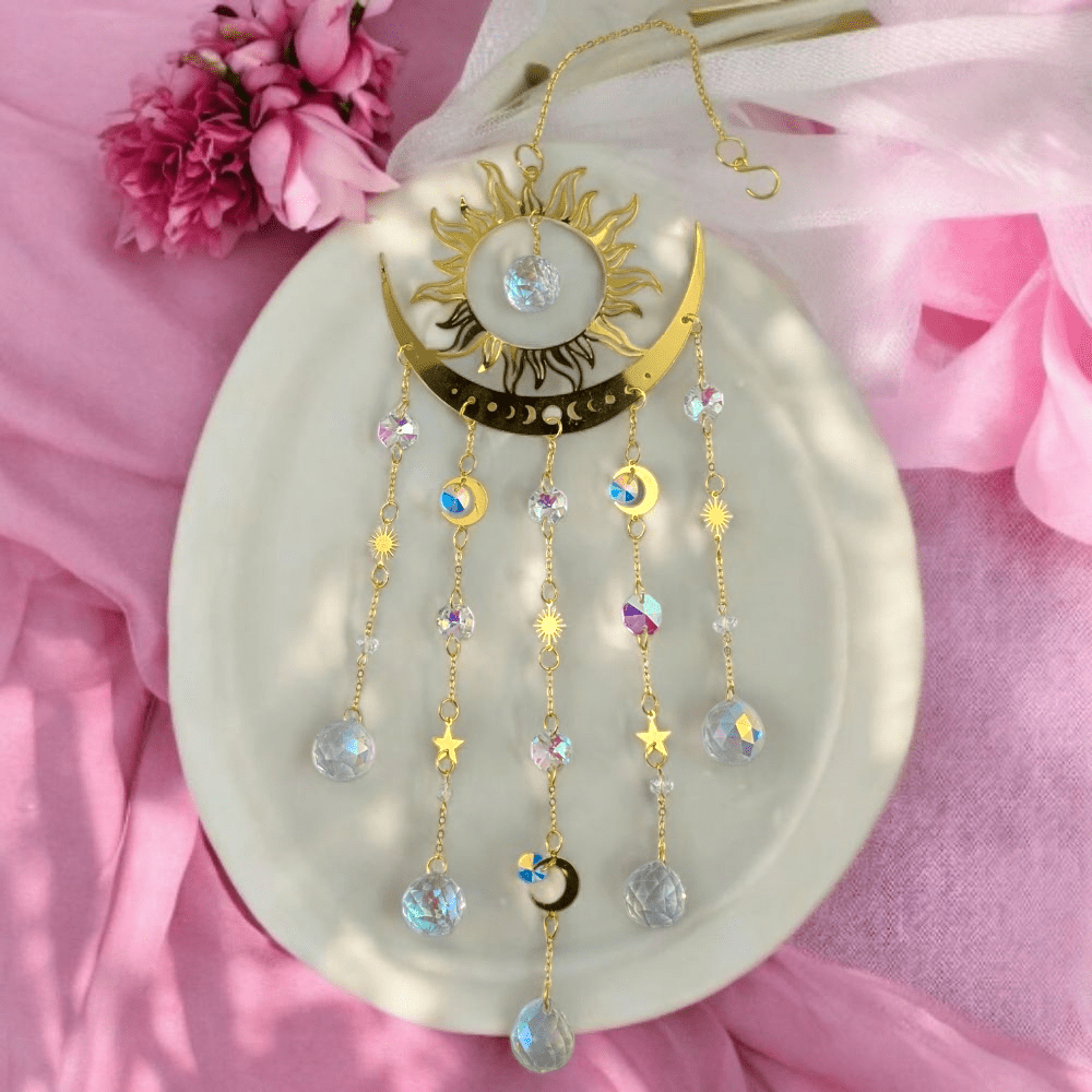 Crystal sun catcher with golden metal
