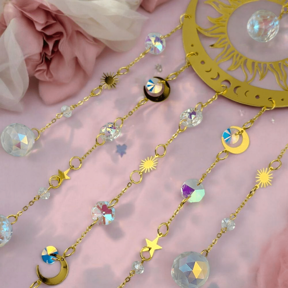 Crystal sun catcher with golden metal