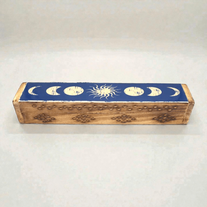 Wooden incense box with celestial design on a white background. Available at zen collection crystal store in Barrie. Shop in-store or online now.