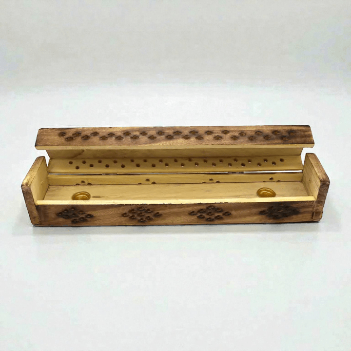 Wooden incense box with celestial design on a white background. Available at zen collection crystal store in Barrie. Shop in-store or online now.
