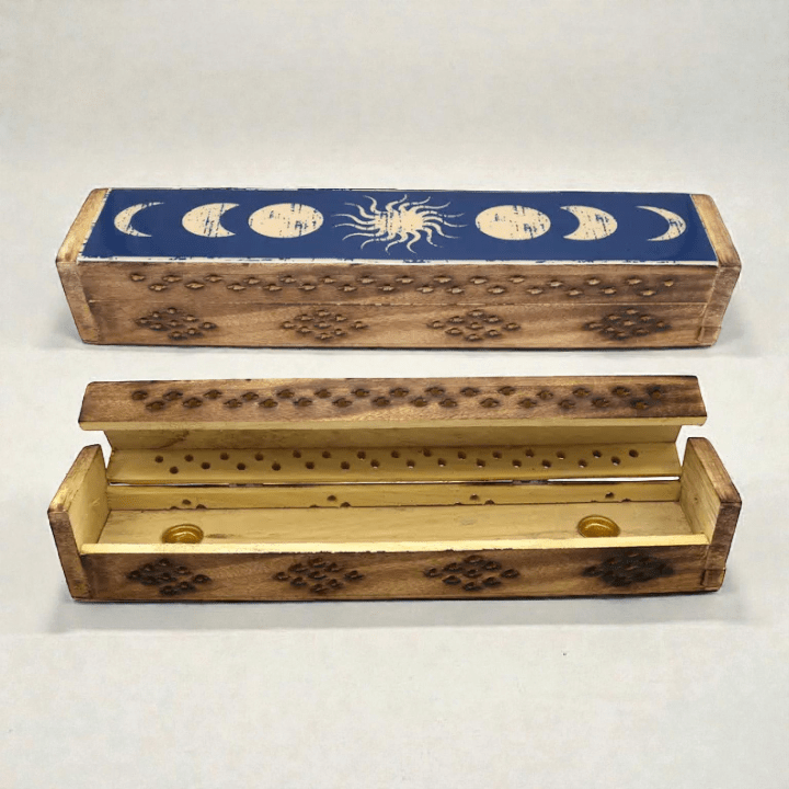 Wooden incense box with celestial design on a white background. Available at zen collection crystal store in Barrie. Shop in-store or online now.