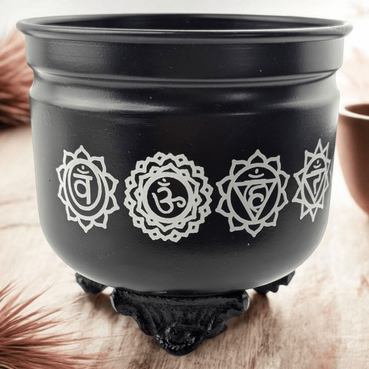 Chakra-etched metal incense burner