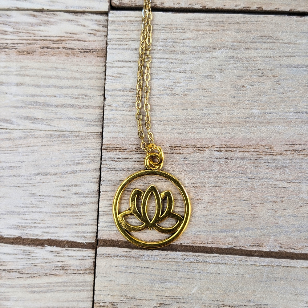 17-inch gold-tone necklace with a secure lobster clasp and meaningful lotus design.