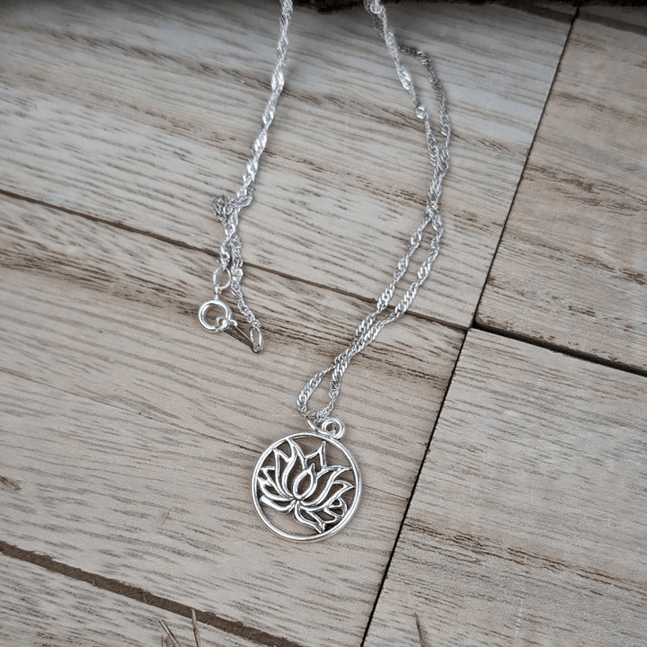 17-inch silver-tone necklace with a secure lobster clasp and meaningful design.