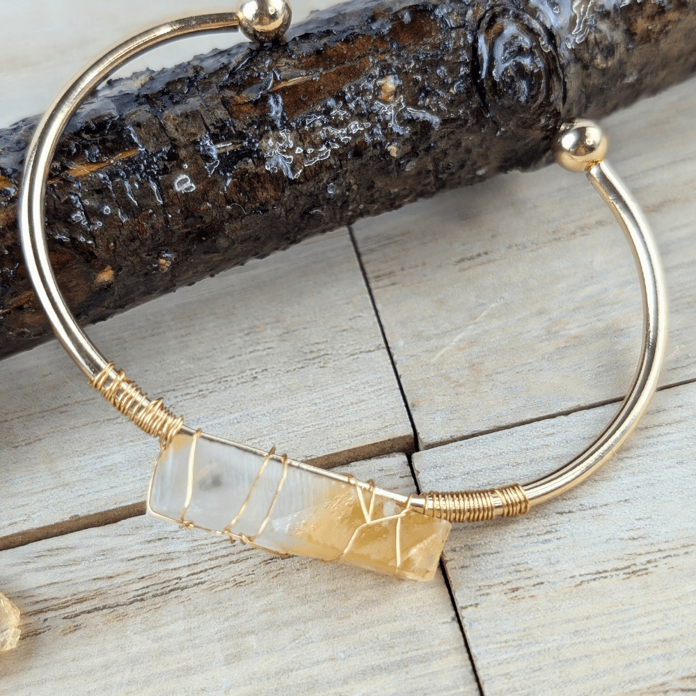 Close-up of citrine stones in a jewelry set.