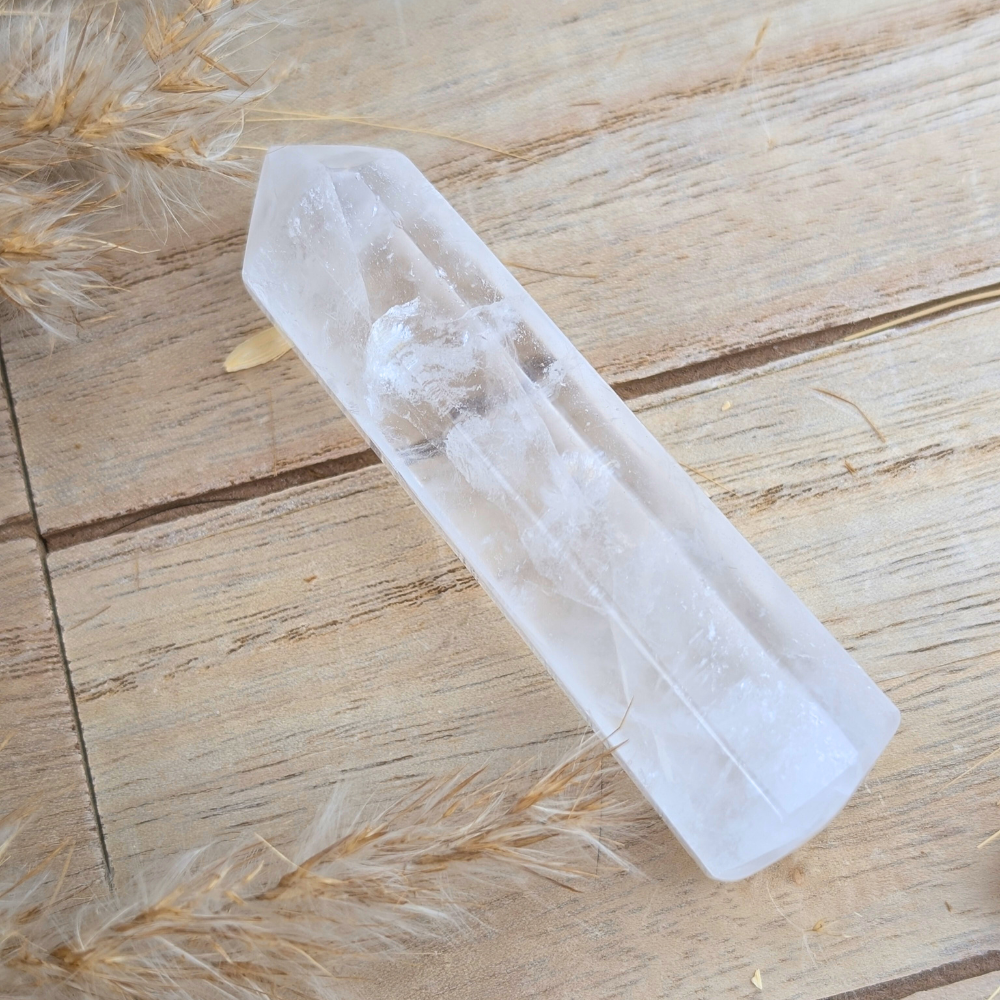 Side view of Clear Quartz crystal point with shimmering clarity