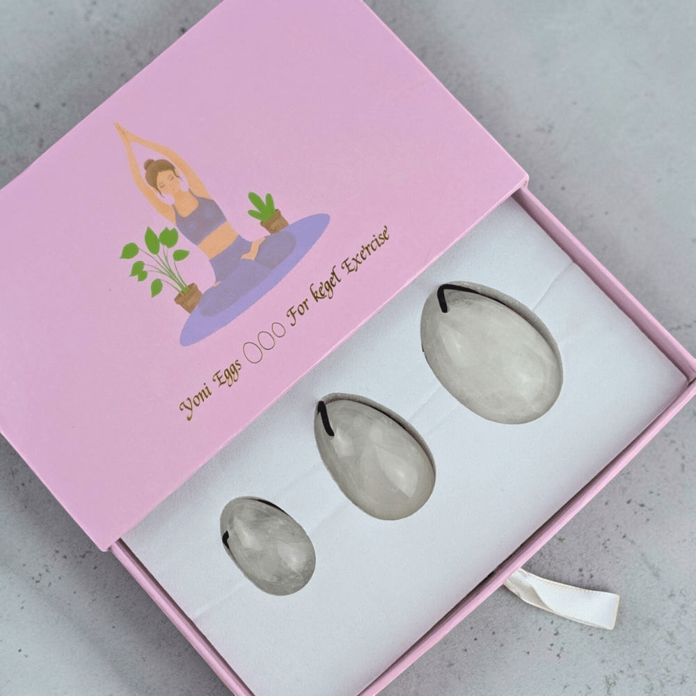 Set of clear quartz yoni eggs for wellness exploration.