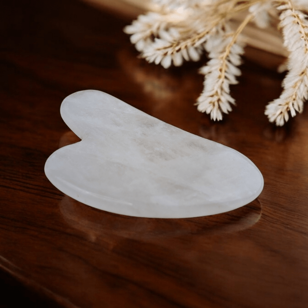 Crystal gua sha for reducing puffiness and enhancing glow