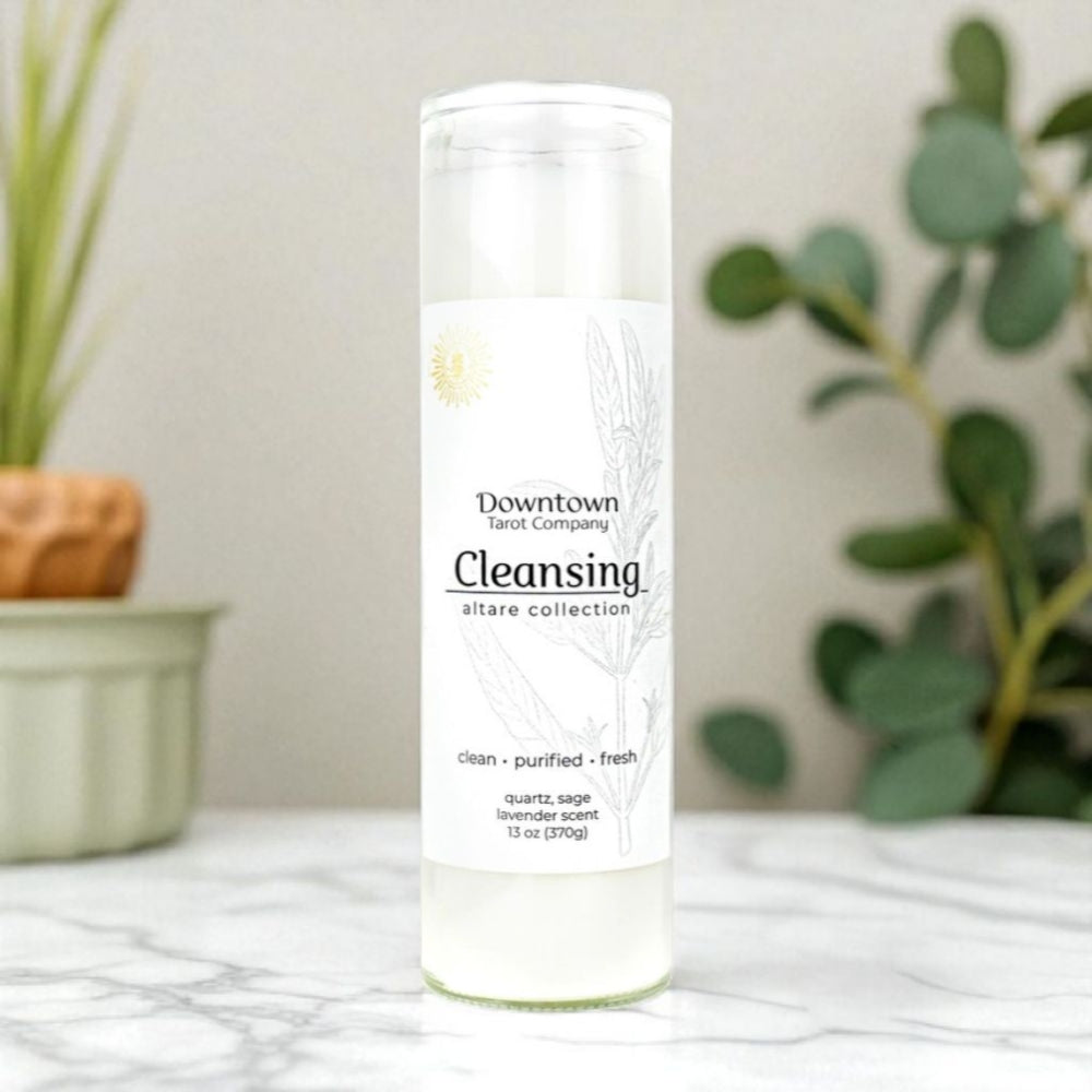 Cleansing candle jar on a neutral background with plants.