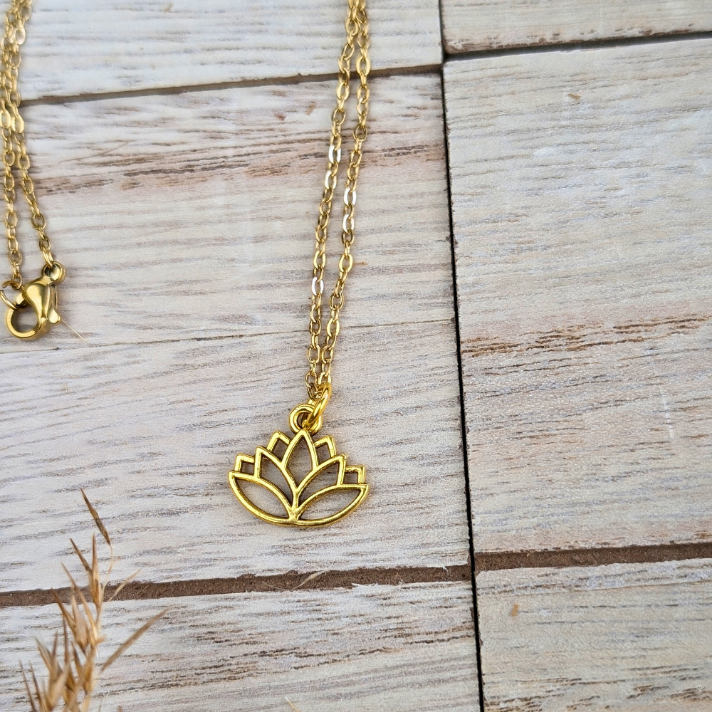 Dainty Gold Lotus Necklace in brass, symbolizing resilience and enlightenment.