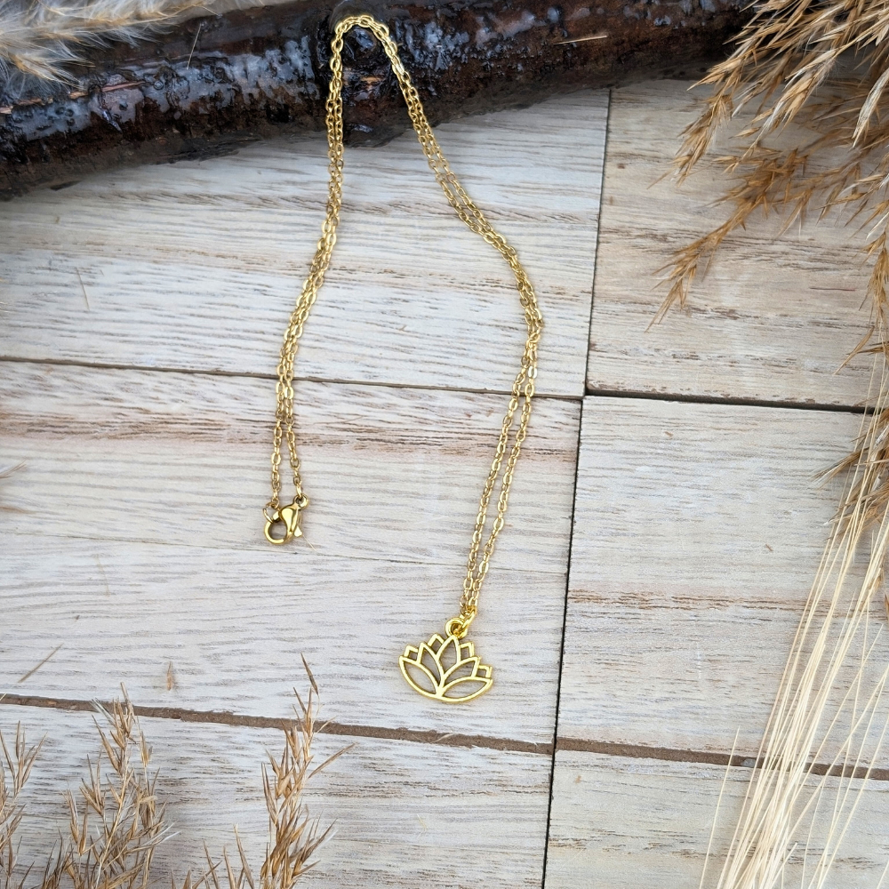 Minimalist brass lotus pendant necklace, spiritual jewelry for personal transformation.