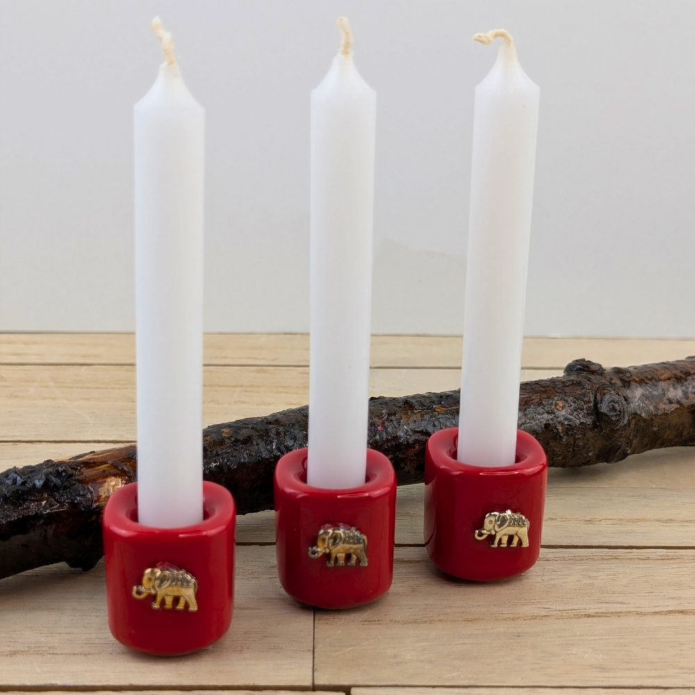 Elephant chime candle holder symbolizing strength and prosperity