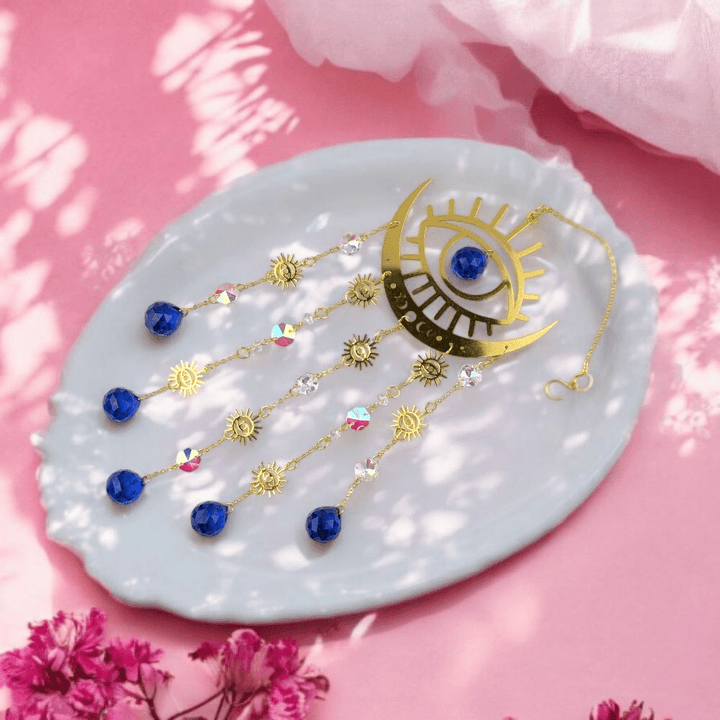 Protective rainbow catcher with Evil Eye symbol