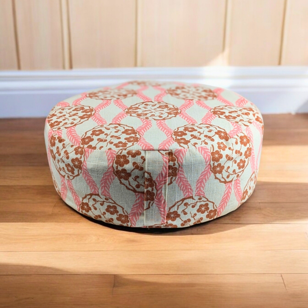 Yoga bolster with soft pink and earthy floral design