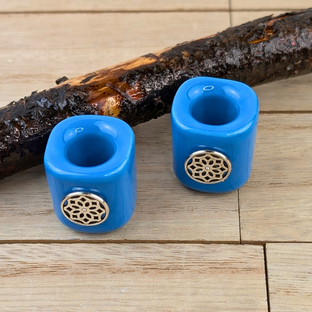 Mini chime candle holder with blue glaze and symbolic charm