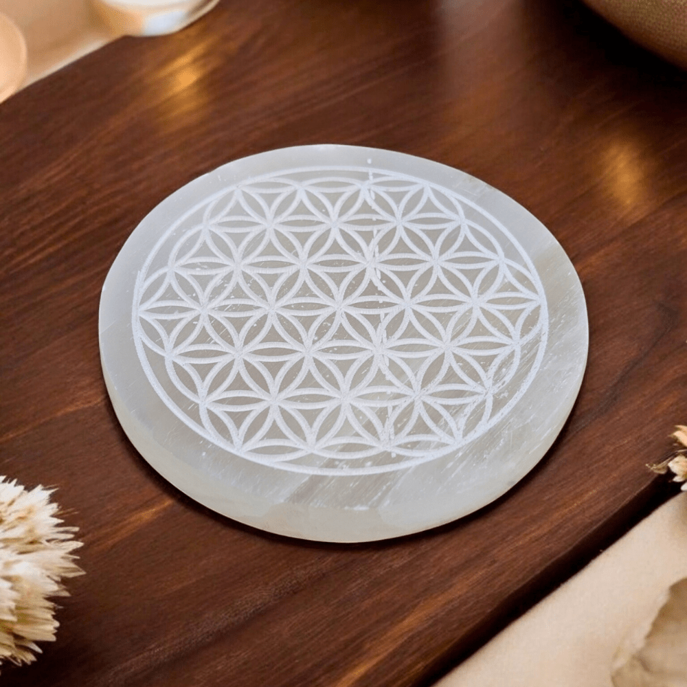 4-inch selenite plate with sacred Flower of Life engraving